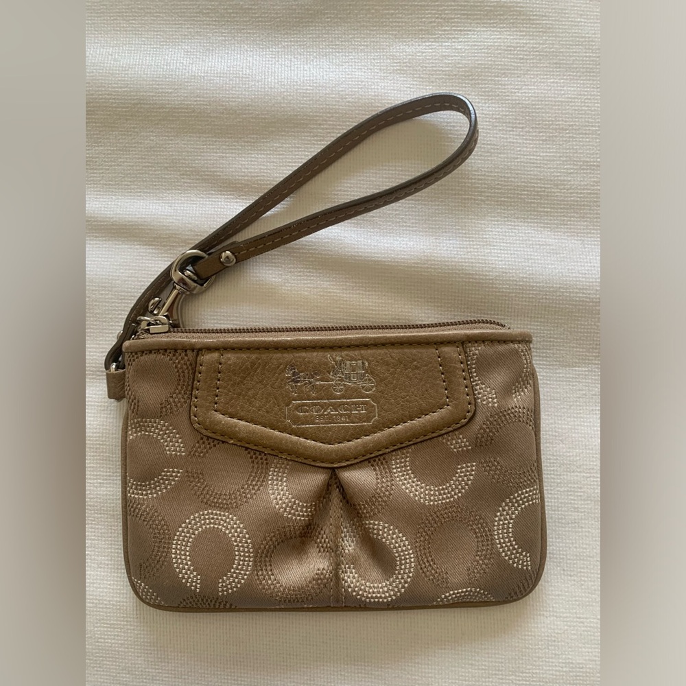 Tan/Brown Coach Wristlet with silver hard wear.